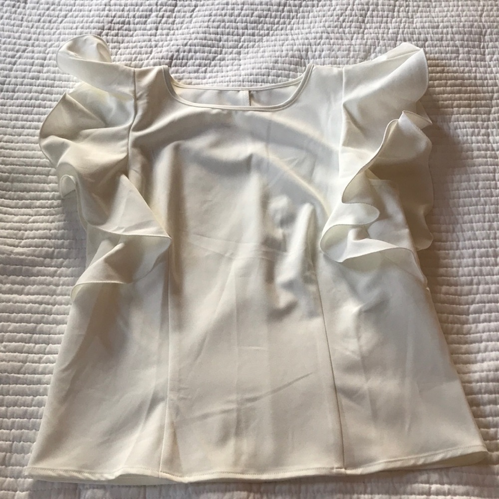 Ruffle-sleeved cream top